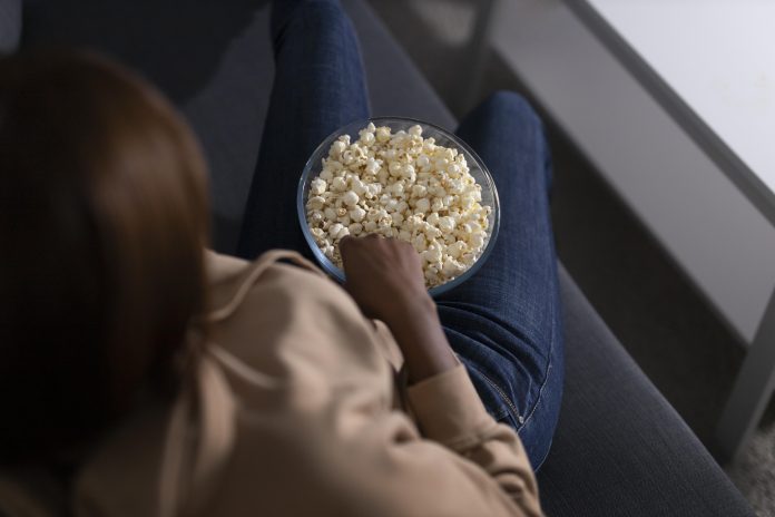 african-american-woman-watching-streaming-service-home